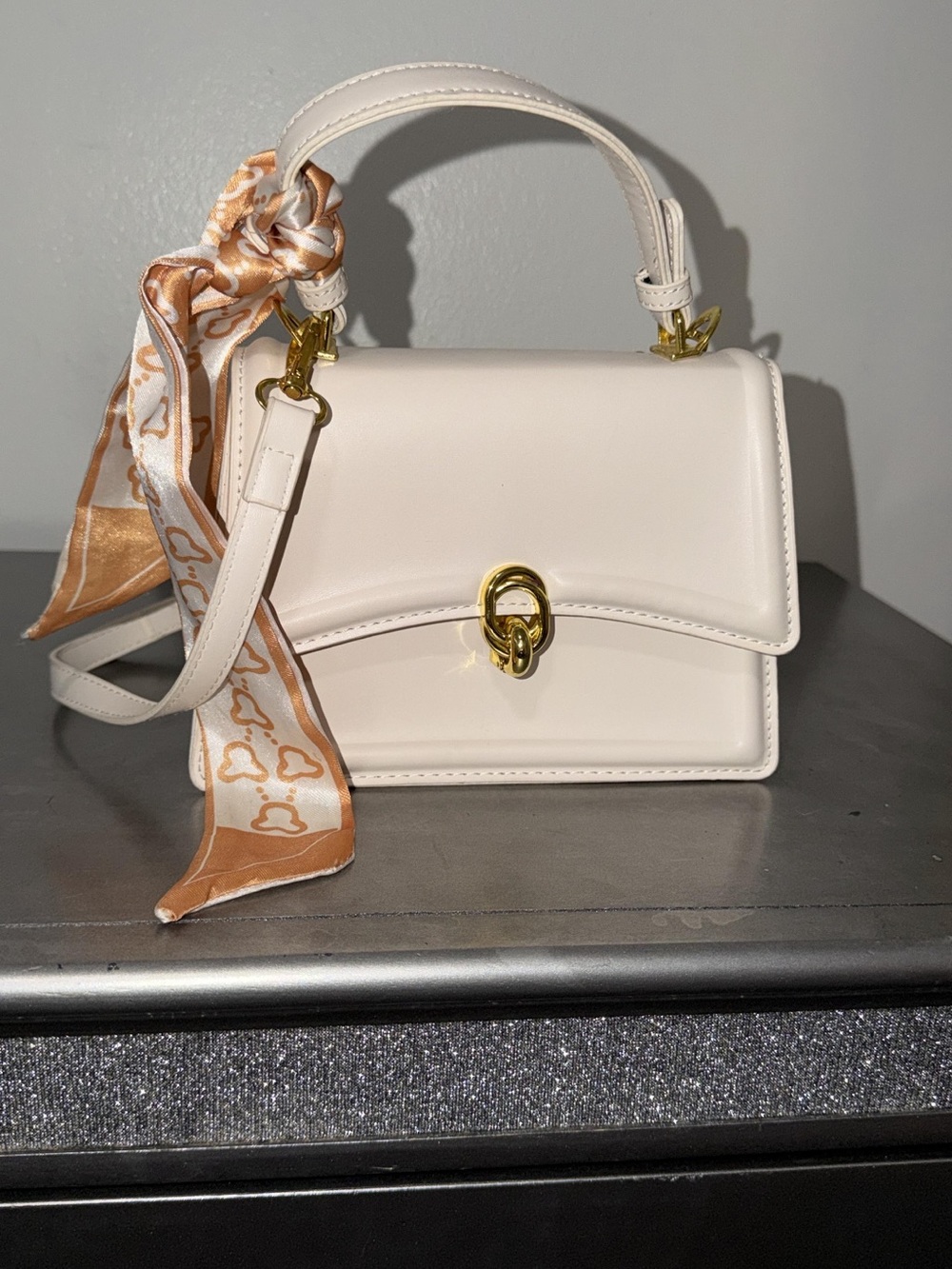 Elegant Cream Top-Handle Crossbody Bag with Gold Hardware